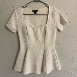 White sculpted top